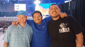 Abel Sosa (center) with brothers in Christ